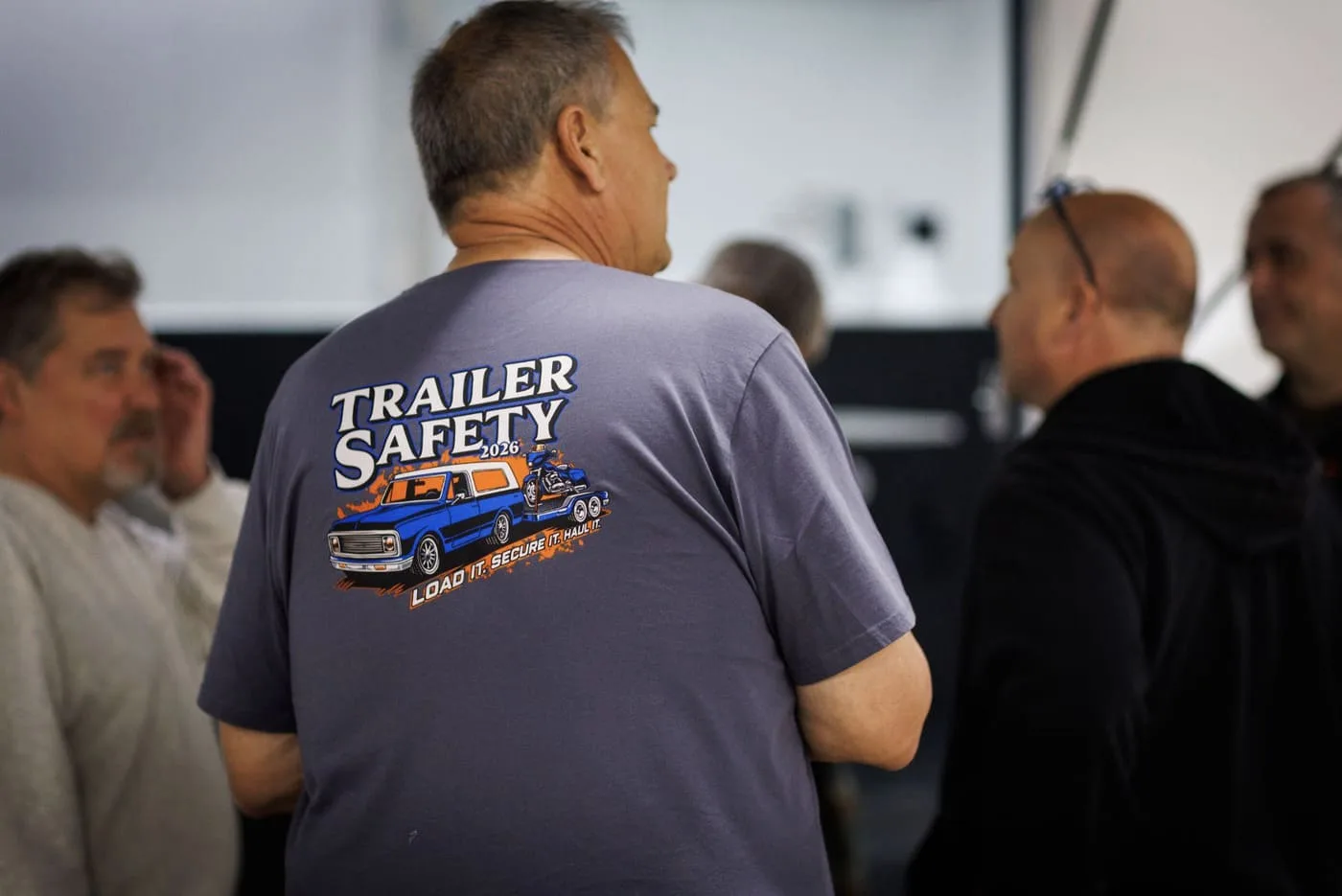 Trailer Safety Week Tshirt on a Man at a Trailer Dealership
