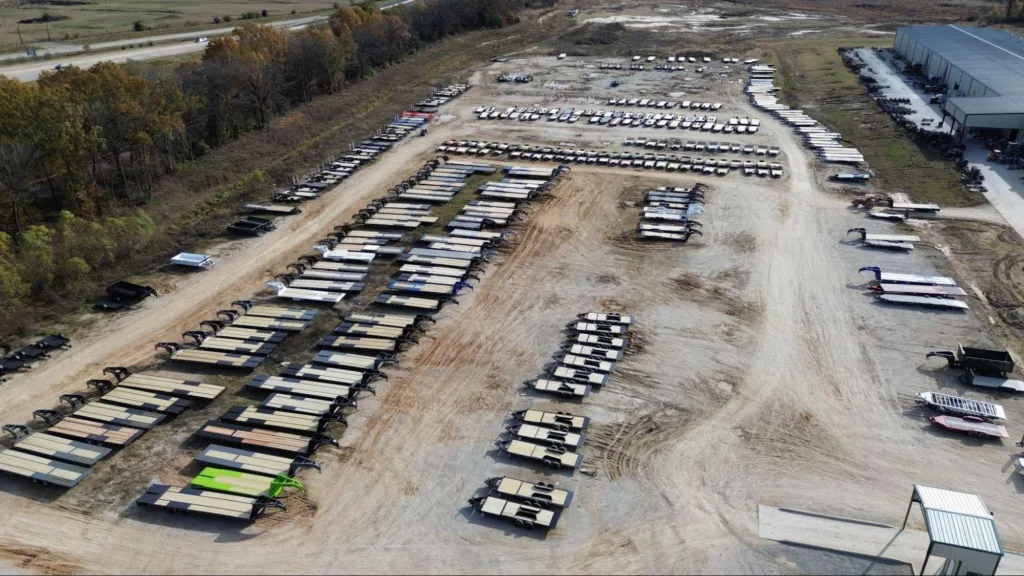 A plot of land full of Diamond C Trailers for Sales
